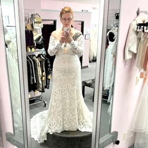 Bought 4 years ago almost brand new $850 dress. Never been worn - Size 12/14